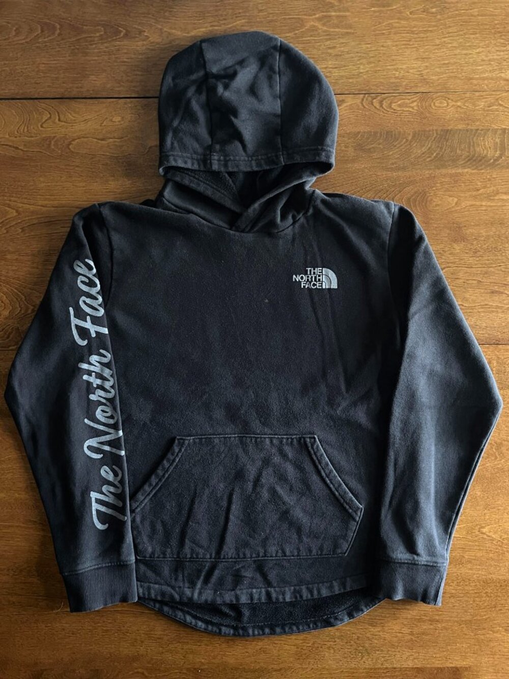 The North Face black hoodie w/ sleeve lettering L 14/16